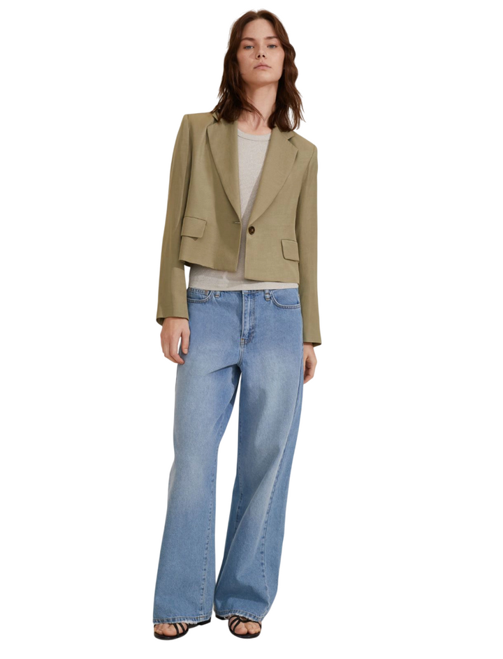 Top a canotta da donna con lamé beige
