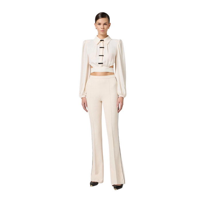 Pantaloni da donna in crêpe con piping a contrasto